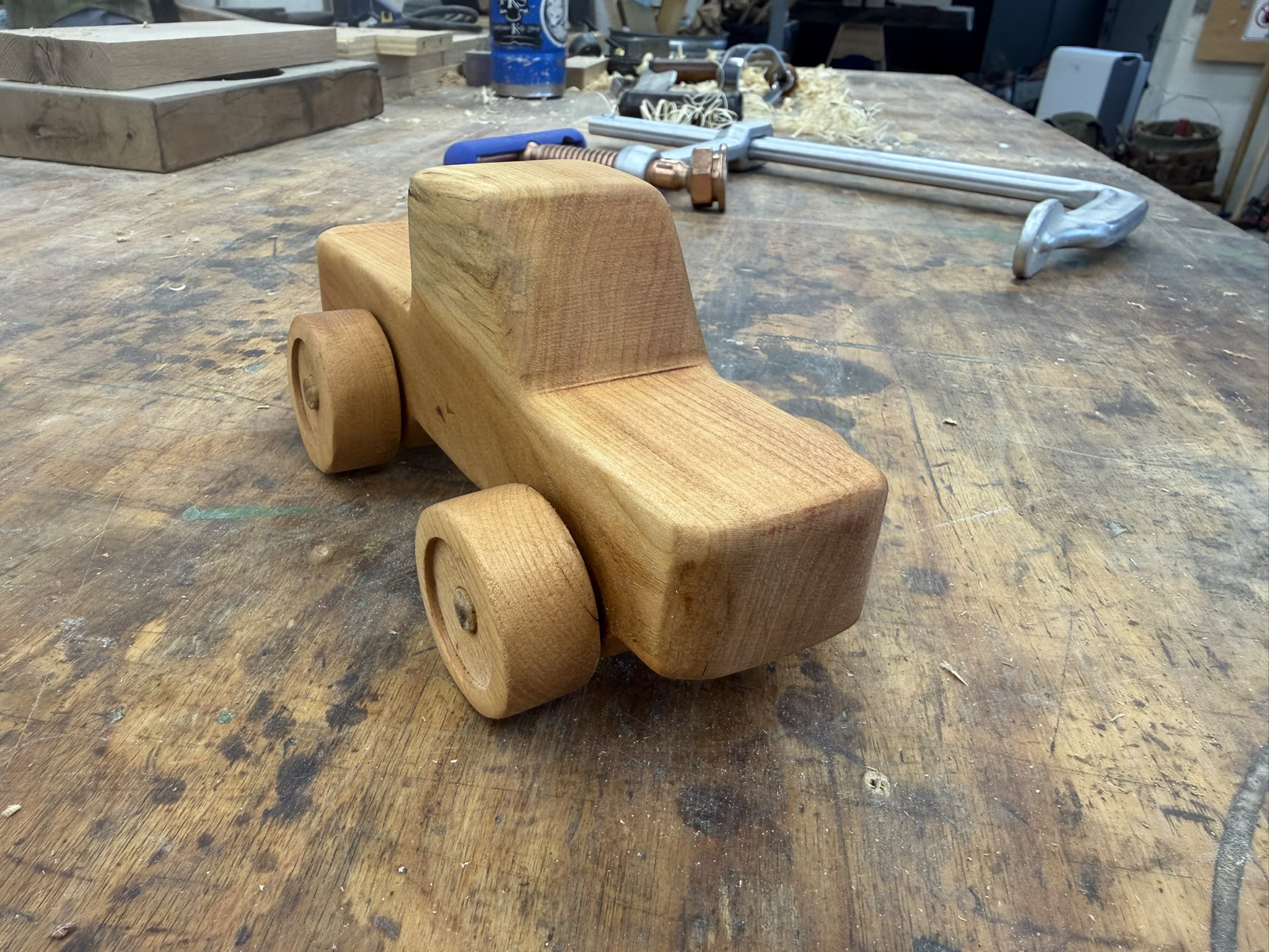 Handcrafted wooden pickup truck, viewed from the front